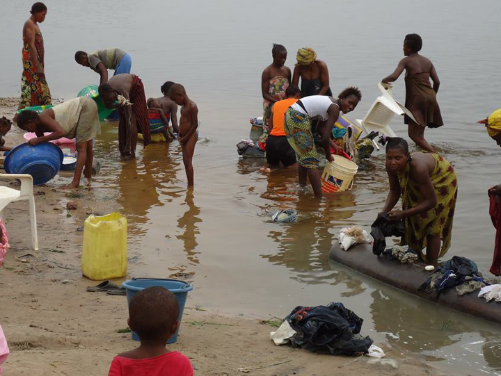 Picture of Congolese Women and Children Using a Water Source