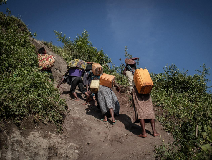 Women Walking a Long Distance Searching for Water